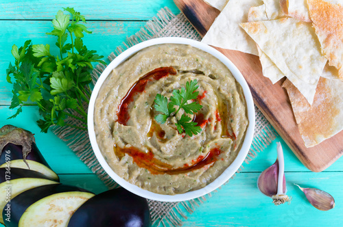 Baba ganush - hummus from eggplant with seasoning, parsley. Eastern cuisine. photo