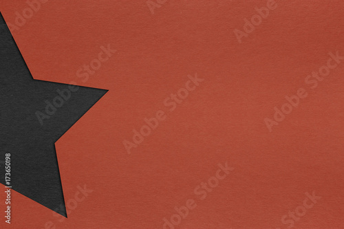 black star with red paper texture