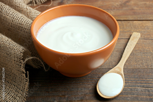 Yogurt, burlap and spoon