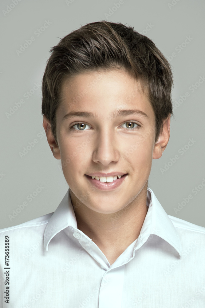 Young teenager posing in white shirt. Young teenager posing in white shirt.