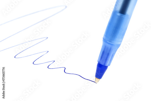 Writing blue ball pen on paper.