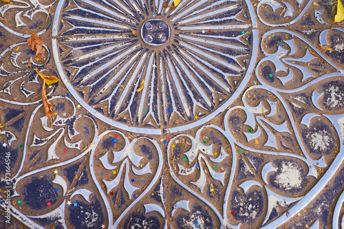 eastern ornament on a metal plate