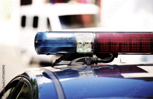Photography Detail of the lights of red and blue police sirens