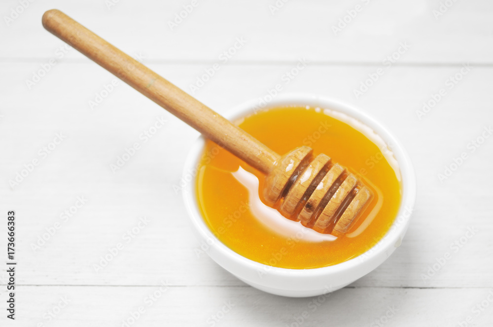 Still life of fresh honey and flowers Still life of fresh honey and flowers