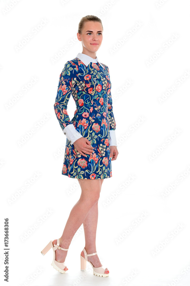 Beautiful sexy woman in elegant dress standing. studio shot. isolated on white background Beautiful sexy woman in elegant dress standing. studio shot. isolated on white background