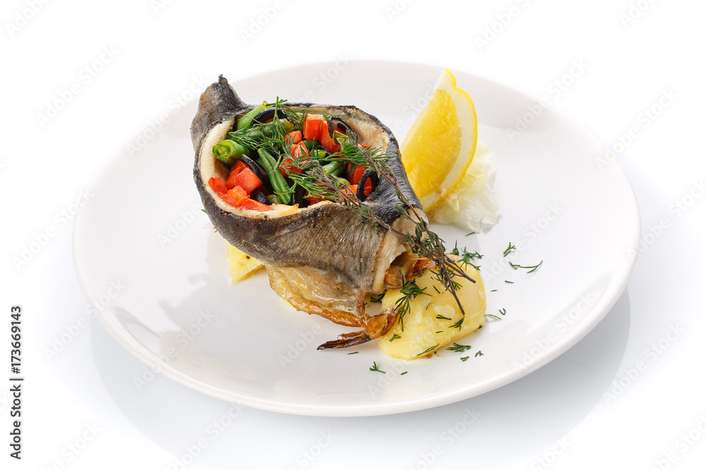 Delicious lunch. Stuffed fish with vegetables Delicious lunch. Stuffed fish with vegetables