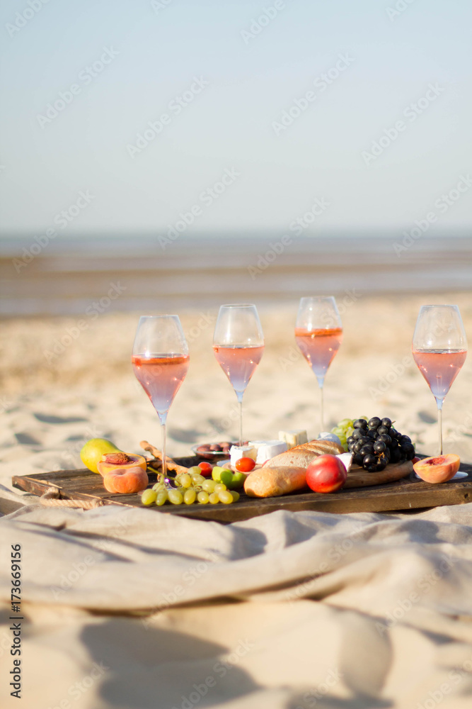 Refreshing Rosa Wine in a Glass . Beach Cheers Celebration Friendship Summer Fun Dinner Concept.