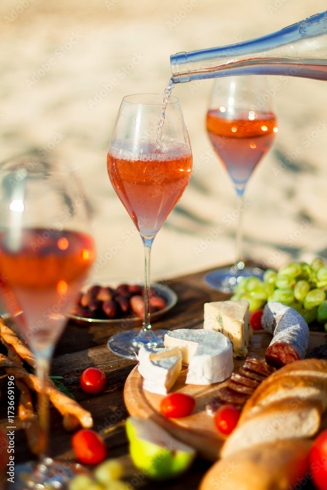 Refreshing  Rosa Wine in a Glass . Beach Cheers Celebration Friendship Summer Fun Dinner Concept.