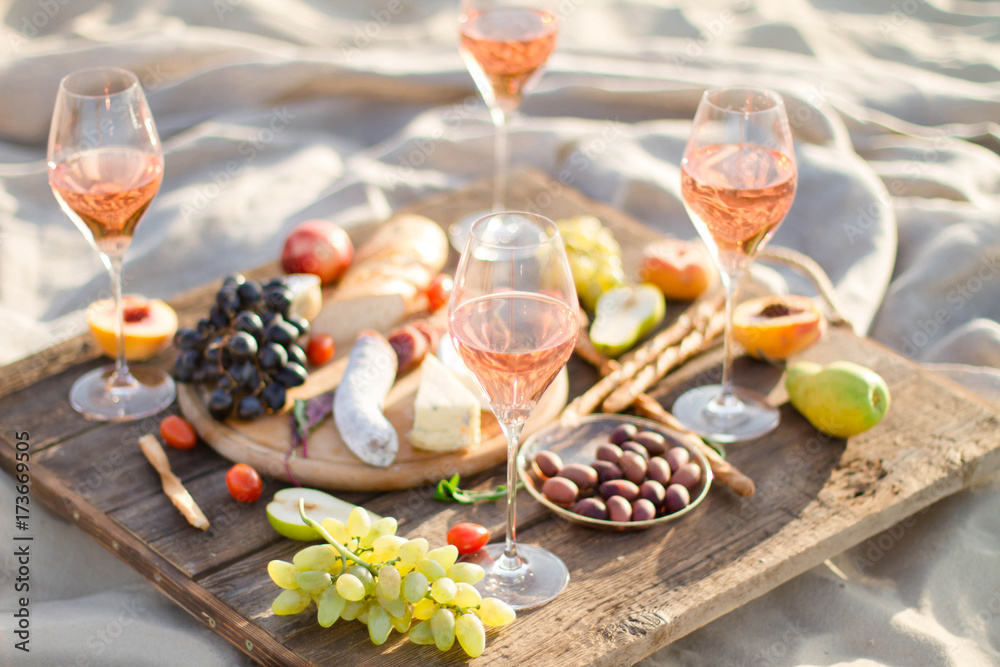 Refreshing Rosa Wine in a Glass . Beach Cheers Celebration Friendship Summer Fun Dinner Concept.