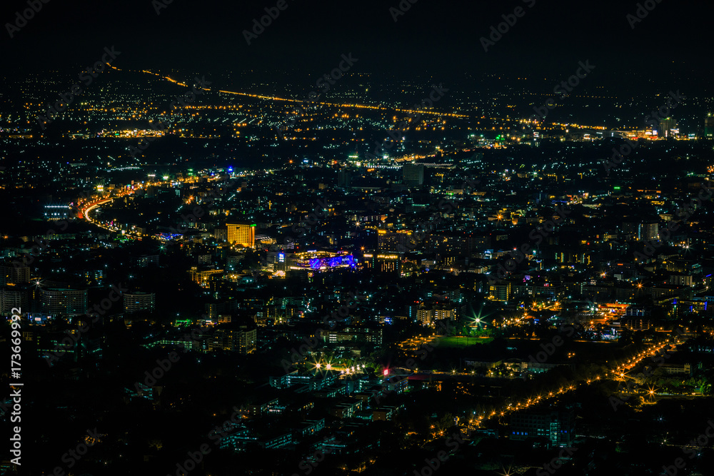 Night city scape at top view point of Chiang Mai, Thailand.
