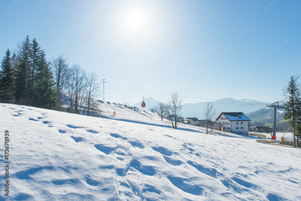 Ski resort in Switzerland. Winter. Traces in the deep snow drifts. In a ski resort in Switzerland.