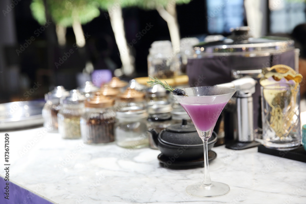 Purple cocktail on bar background Purple cocktail on bar background