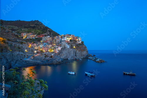 Fototapeta Naklejka Na Ścianę i Meble -  MANAROLA, ITALY, JULY 31, 2017 - View of Manarola by night, 5 Terre, La Spezia province, Ligurian coast, Italy.