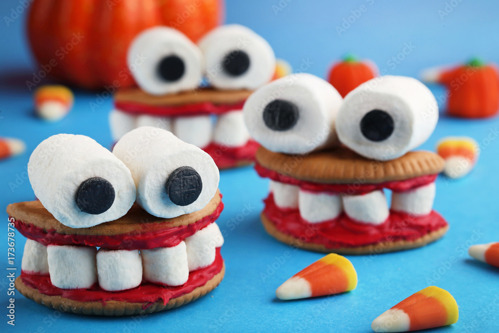 Halloween cookies jaws with marshmallows on blue background