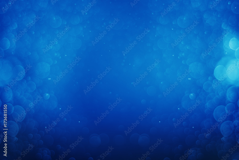 Glitter light blue bokeh christmas blurred background Glitter light blue bokeh christmas blurred background