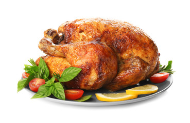 Plate with roasted turkey on white background