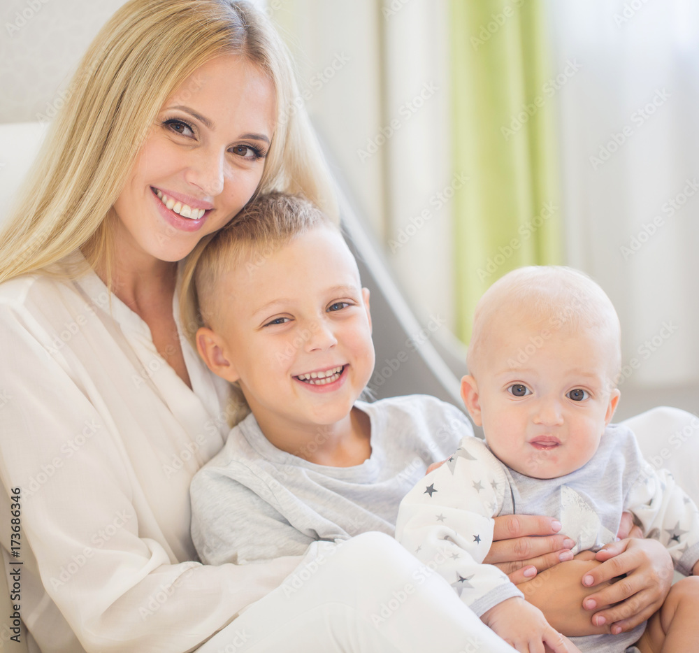 Portrait of happy mother with two sons Portrait of happy mother with two sons