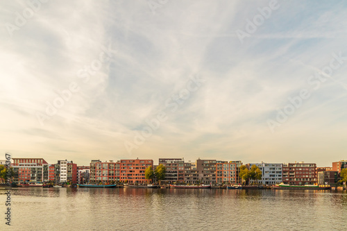 Photography Contemporary apartment buildings and houseboats in Amsterdam