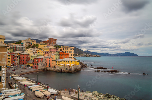 GENOA  GENOVA   ITALY  SEPTEMBER  16  2017 - Long exposure photo of Genoa Boccadasse under a cloudy sky  a fishing village and colorful houses in Genoa  Italy