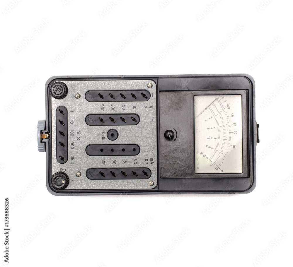 Fototapeta premium Old retro multimeter isolated on white background. Obsolete technologies.