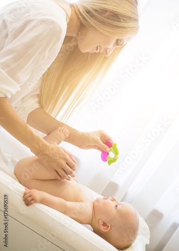 Portrait of happy mother with infant son