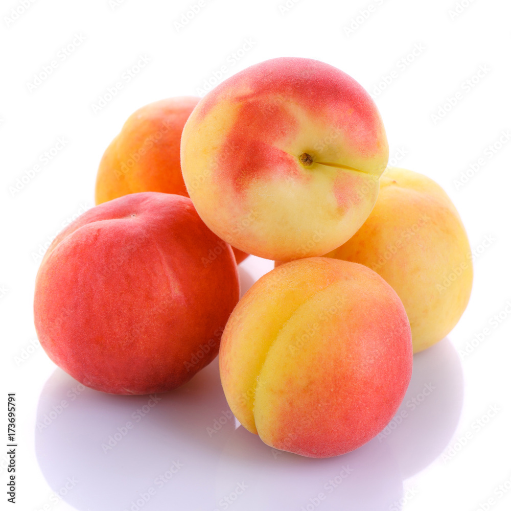Fresh organic peaches isolated on white background Fresh organic peaches isolated on white background