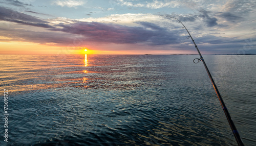 Fishing in sunset scenery