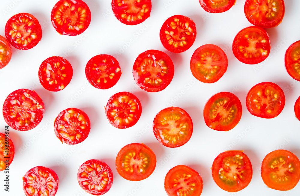 Sliced cherry tomatoes background Sliced cherry tomatoes background