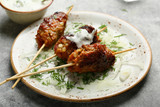  beef kebab with sauce and dill