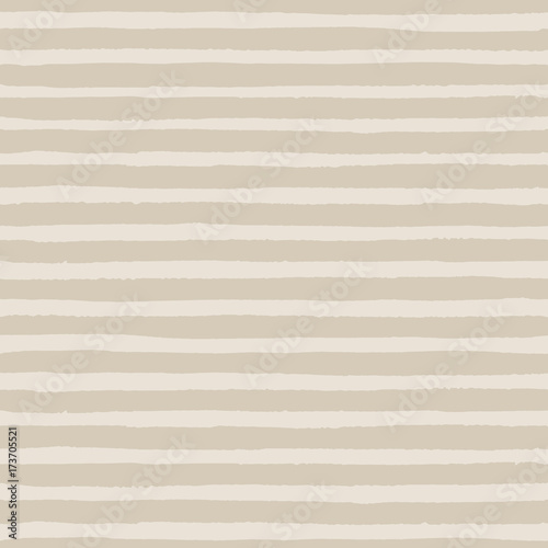 Hand drawn vector grunge stripes of pale brown color seamless pattern on the beige background. Texture for your design.