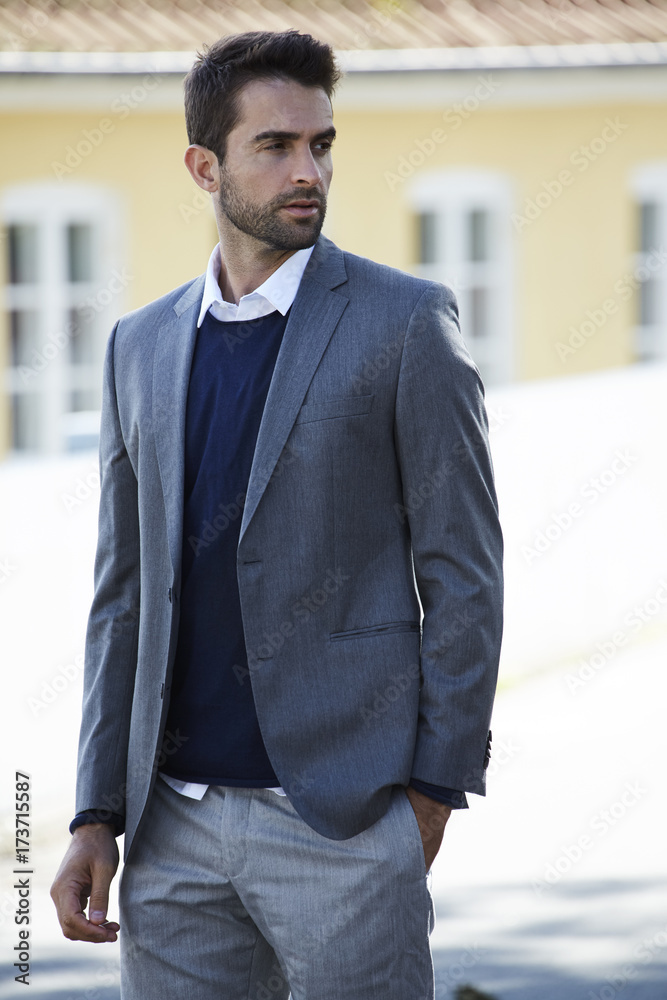 Handsome dude in grey suit jacket, looking away Handsome dude in grey suit jacket, looking away