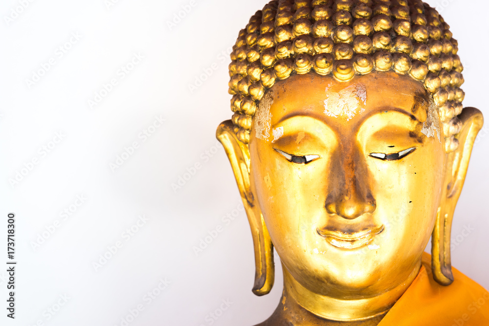 face of Buddha statue with white background