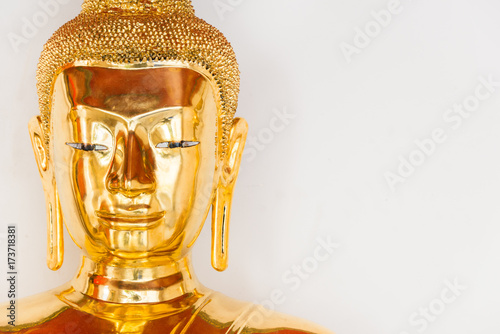 face of Buddha statue with white background