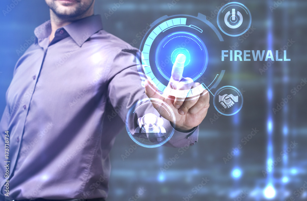 The concept of business, technology, the Internet and the network. A young entrepreneur working on a virtual screen of the future and sees the inscription: Firewall The concept of business, technology, the Internet and the network. A young entrepreneur working on a virtual screen of the future and sees the inscription: Firewall