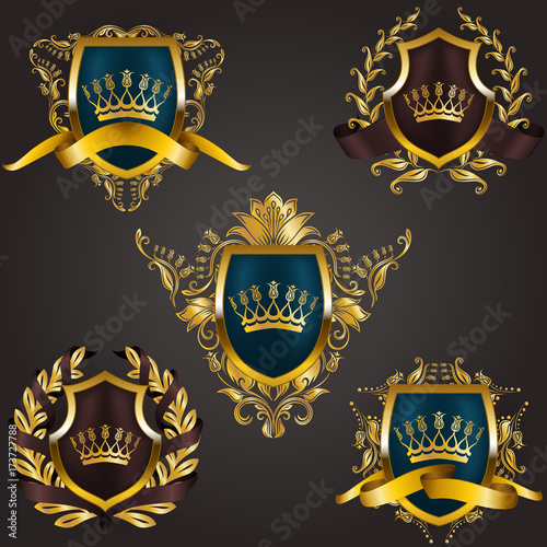 Set of golden royal shields with floral elements, ribbons, laurel wreaths for page, web design. Old frame, border, crown, divider in vintage style for label, emblem, badge, logo. Illustration EPS10