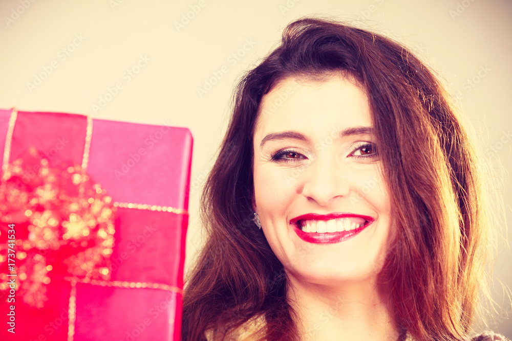 Woman with red christmas gift box Woman with red christmas gift box