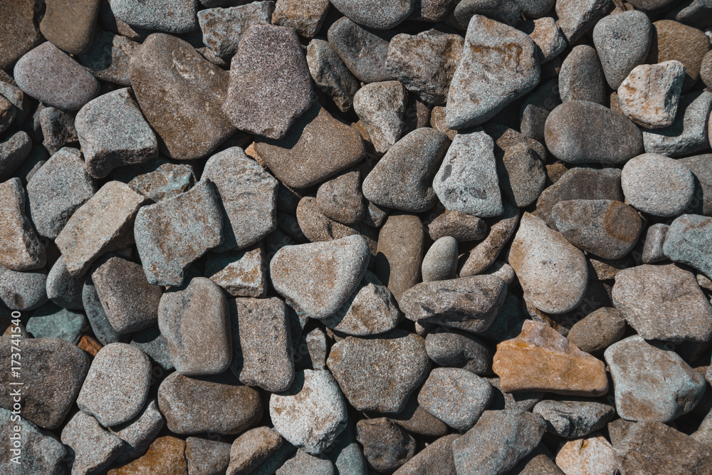 Beautiful flat stones on the seashore. Gorgeous background Beautiful flat stones on the seashore. Gorgeous background