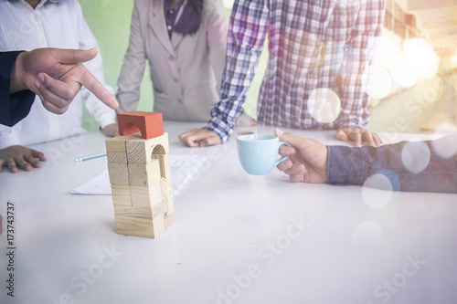 Planning, risk and strategy in business, business gambling placing wooden block