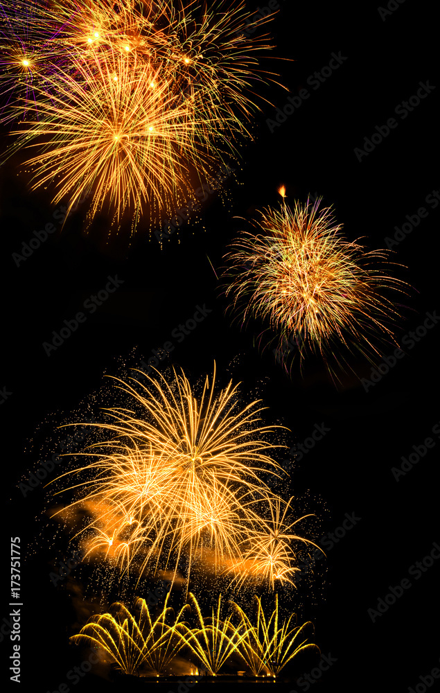 beautiful gold firework display for celebration happy new year and merry christmas and  fireworks on black isolated background
