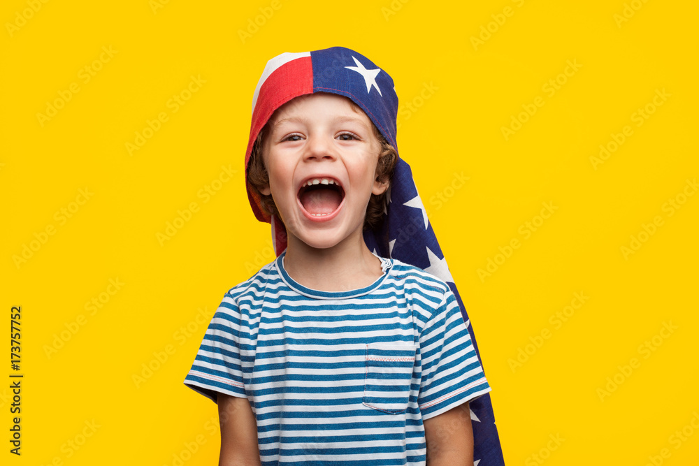 Cheerful kid with flag on head Cheerful kid with flag on head