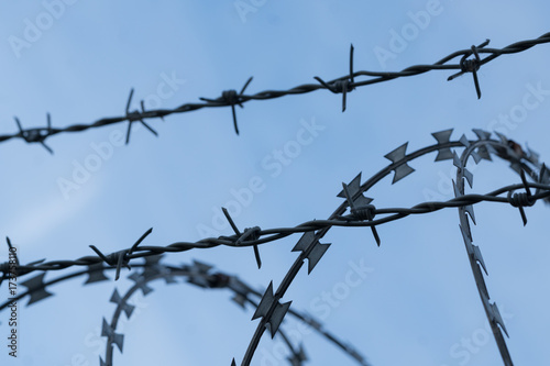 Fence with barbed wire