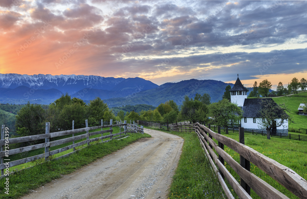 Traditional easy mountain Monastery and stunning sunset,Bran,Transylvania,Romania - obrazy, fototapety, plakaty 