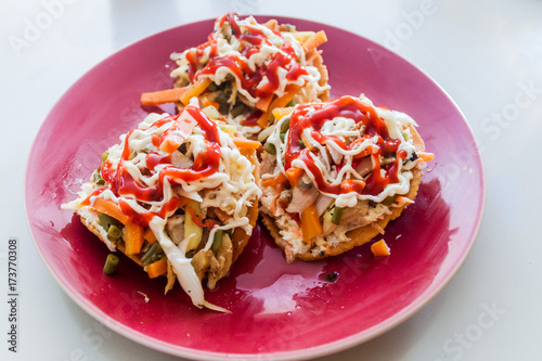 Plate of Salvadoran enchiladas photo