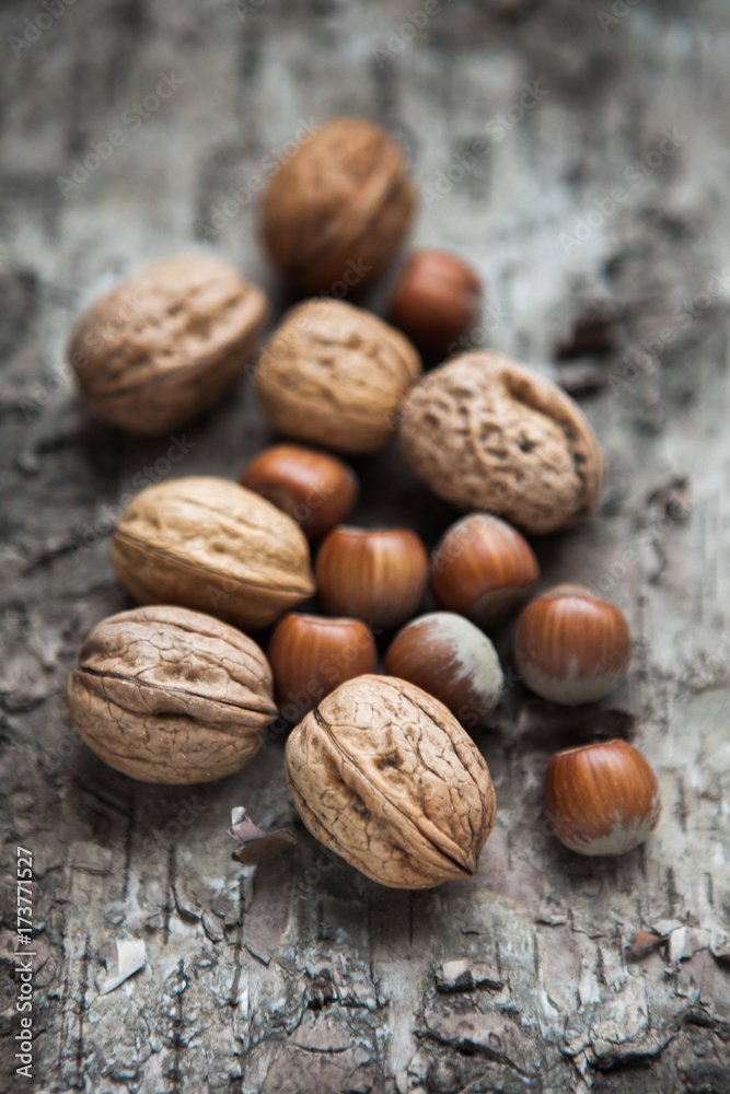 Mixed nuts on wooden background Mixed nuts on wooden background