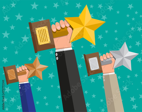 Trophy winner gold star cup with wooden base