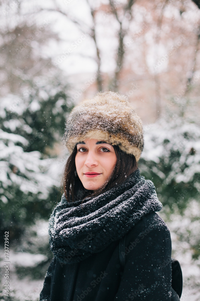 Portrait of a beautiful brunette woman looking at camera