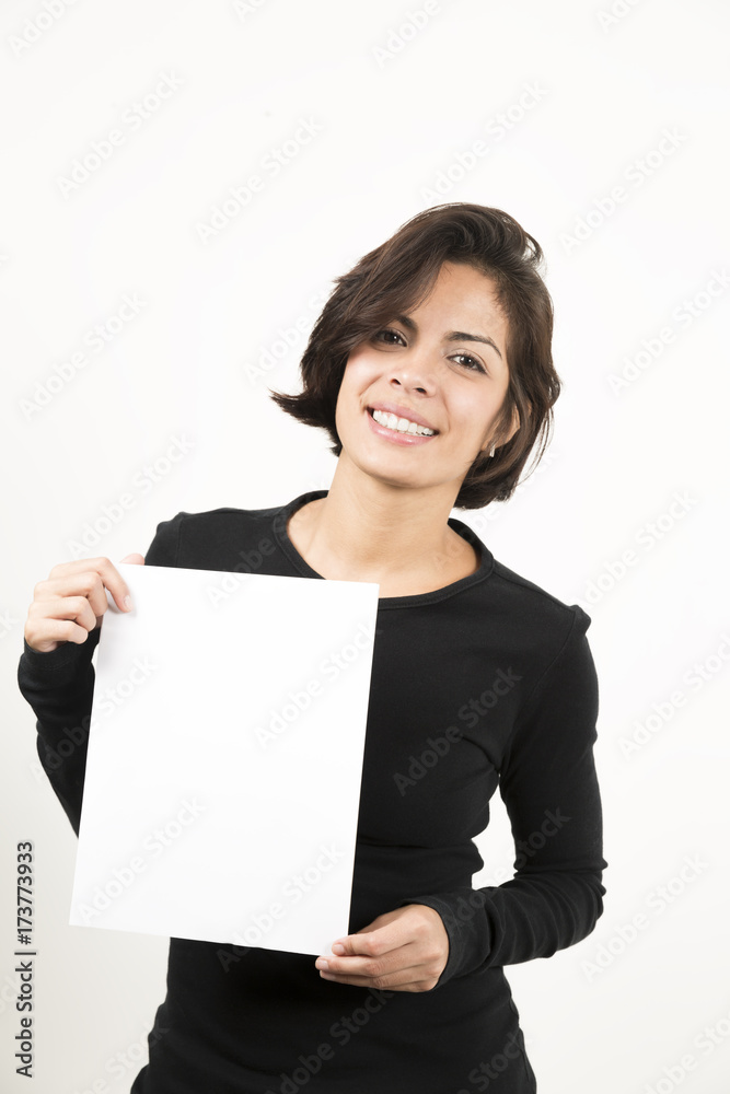 Beautiful young woman holding a blank sheet of paper Beautiful young woman holding a blank sheet of paper