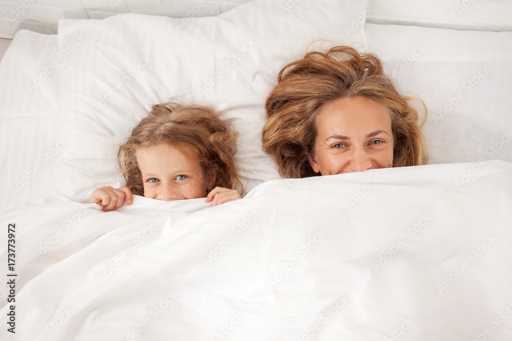 Mother with child in bed Mother with child in bed