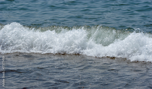 Small waves on the sea coast © serhio777