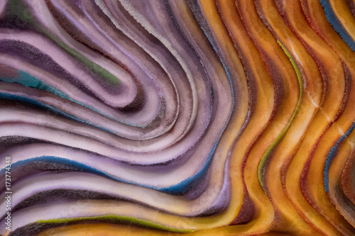 close up of abstract paint swirl pattern